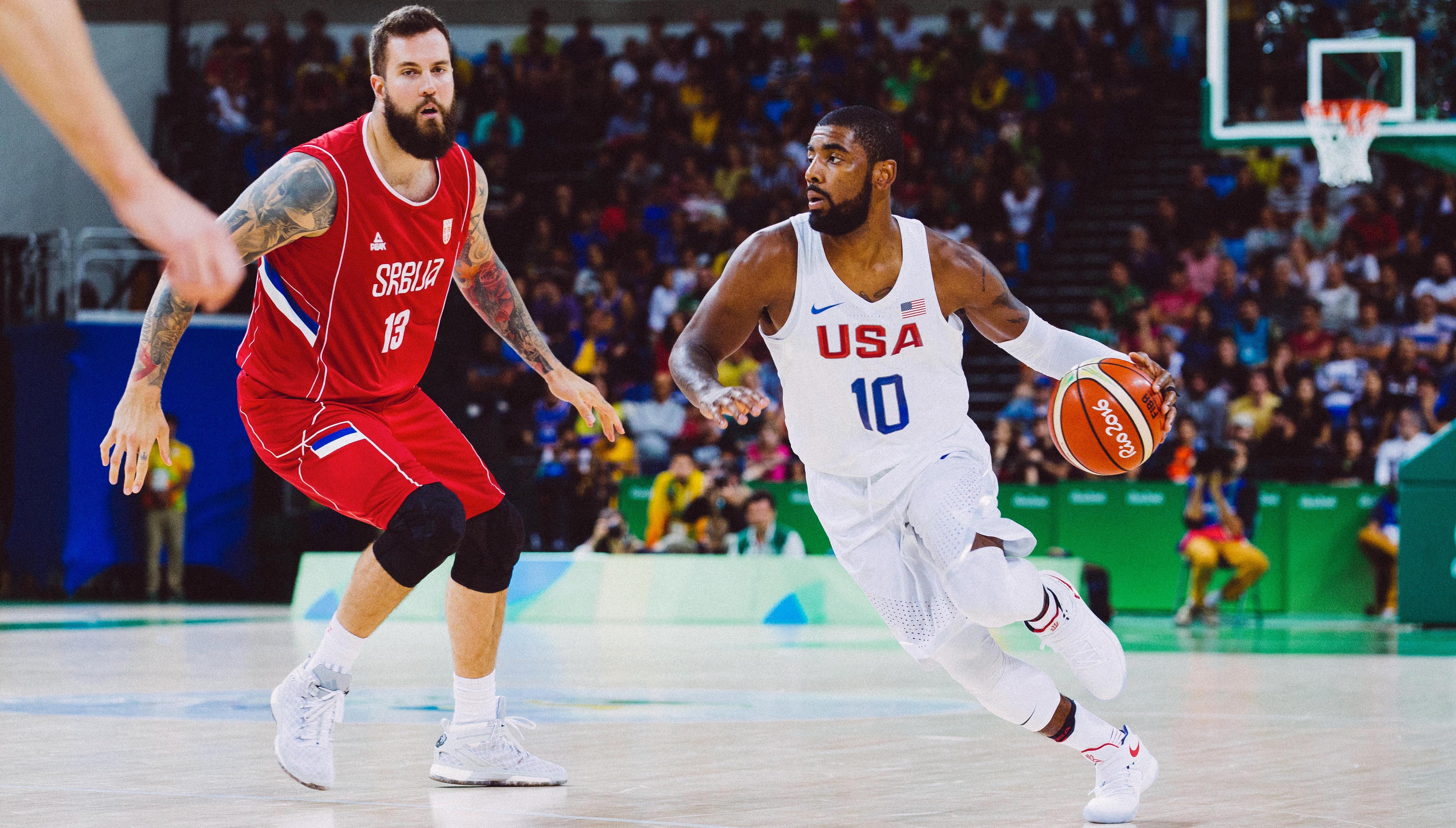 Two basketballplayers on the basketball court